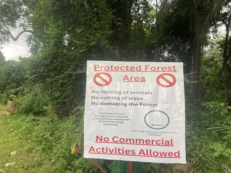 Protected Forest Area signboard erected by SILCC and the Konta Village Community, prohibiting hunting, tree cutting, and commercial activities